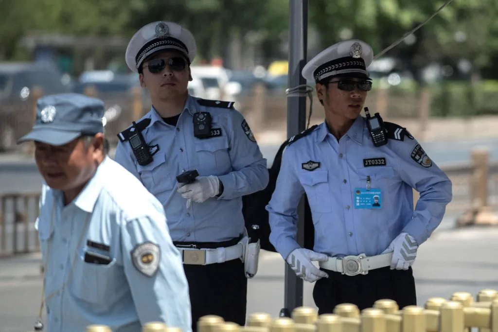 Police officers stand guard near Tiananmen Square in Beijing on June 4, 2018. (Fred Dufour/AFP/Getty Images)