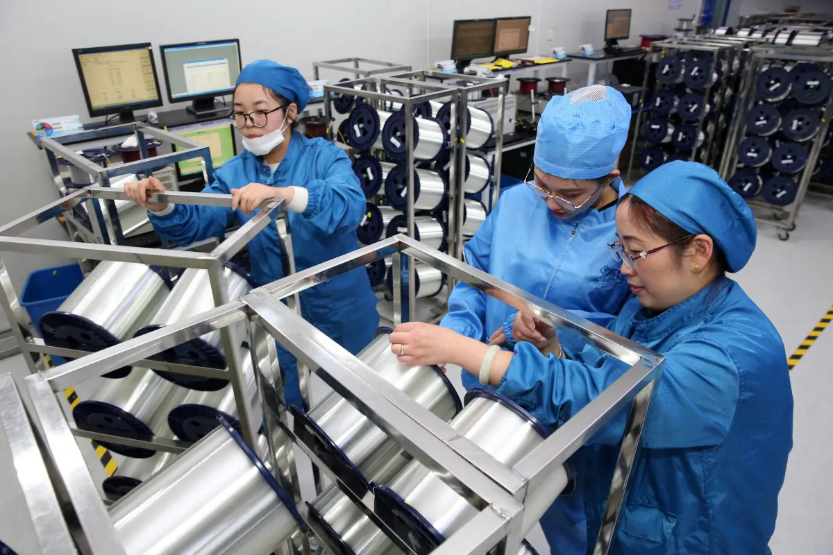 Staff working in a factory that produces fiber optic cable in Nantong, in China's eastern Jiangsu province on Nov. 27, 2018 (-/AFP/Getty Images)