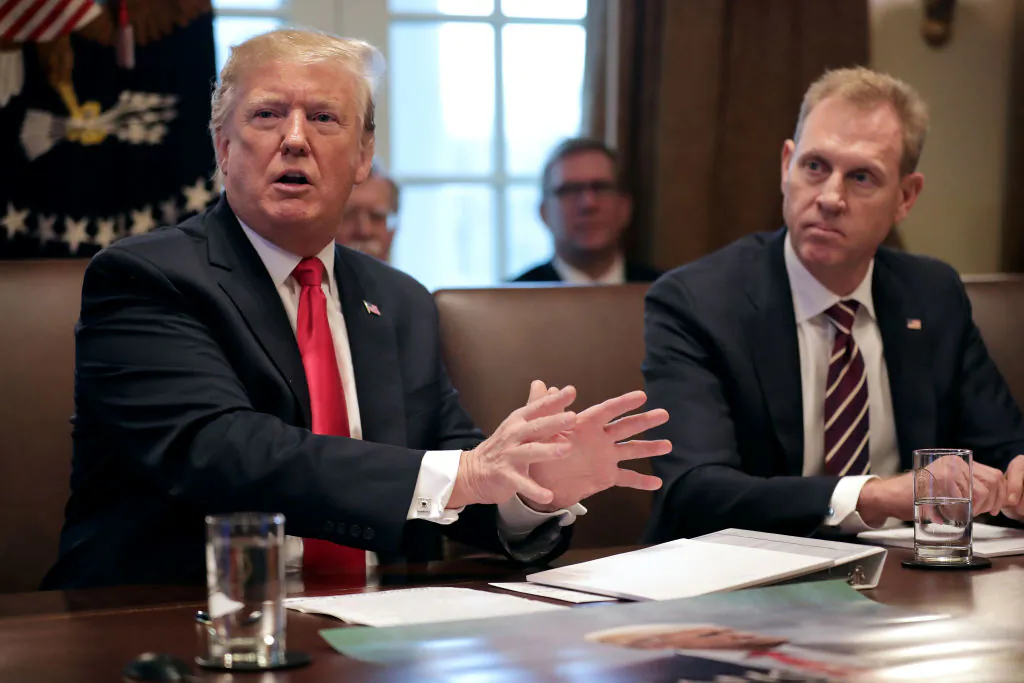 President Donald Trump (L) talks to journalists during a meeting with members of his Cabinet, including acting Defense Secretary Patrick Shanahan, at the White House in Washington, on Jan. 02, 2019. (Chip Somodevilla/Getty Images)