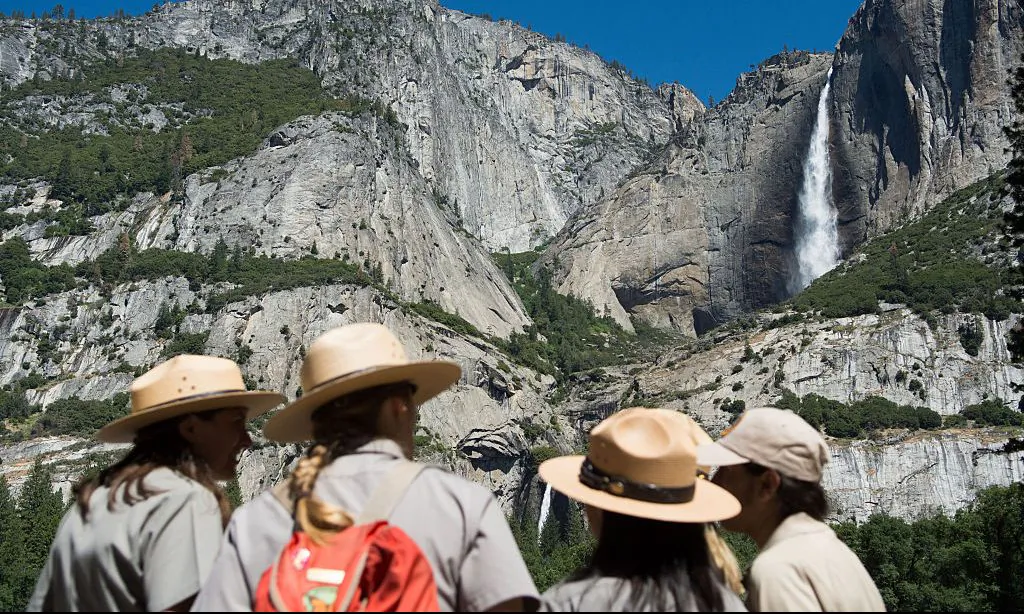 Park rangers meet in front of Yosemite Falls on June 18, 2016, in Yosemite National Park, California. (David Calvert/Getty Images)
