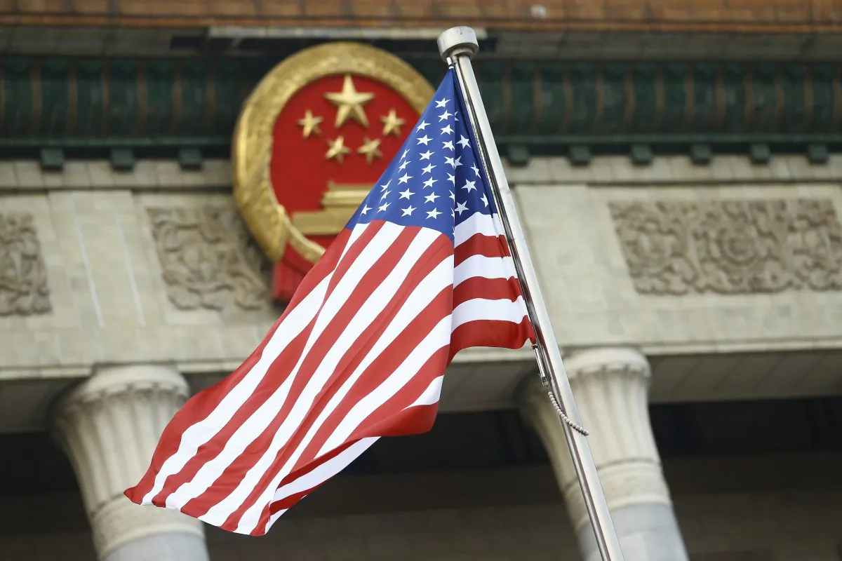 The U.S. flag flies at a welcoming ceremony between Chinese leader Xi Jinping and U.S. President Donald Trump in Beijing on Nov. 9, 2017. Trump was on a 10-day trip to Asia. (Thomas Peter/Pool/Getty Images)