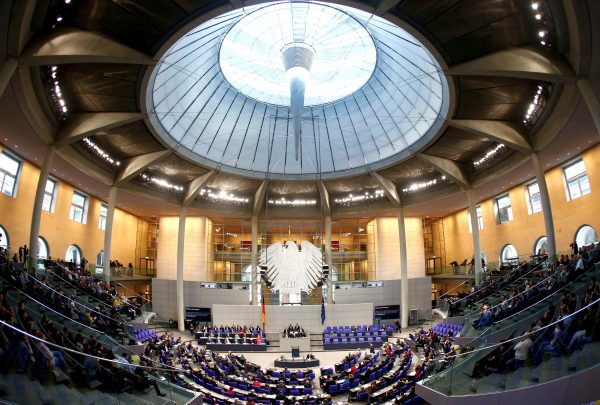German Chancellor Angela Merkel addresses the lower house of parliament Bundestag