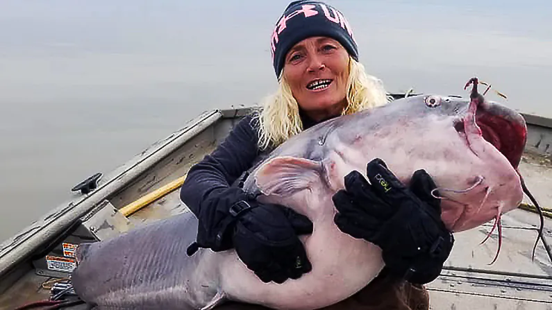 Paula Cathey Smith landed this gigantic 88-pound river catfish on her last day of fishing in 2018. (Paula Cathey Smith/Facebook)