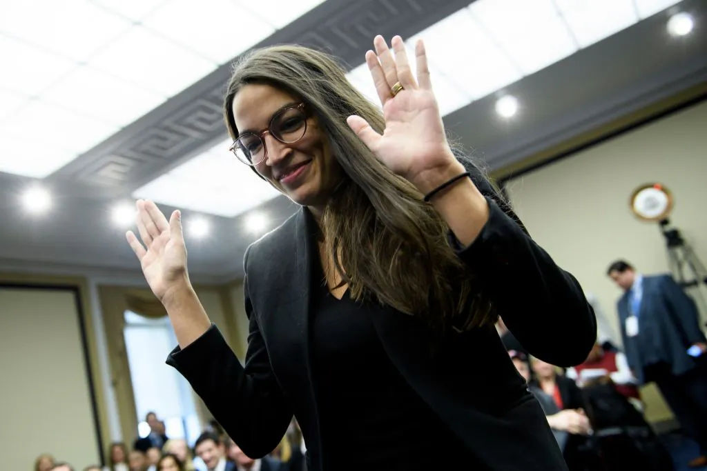Alexandria Ocasio-Cortez (D-NY) walks up to participate in drawing a lottery number for her new office on Capitol Hill in Washington, on Nov. 30, 2018. (Brendan Smialowski/AFP/Getty Images)