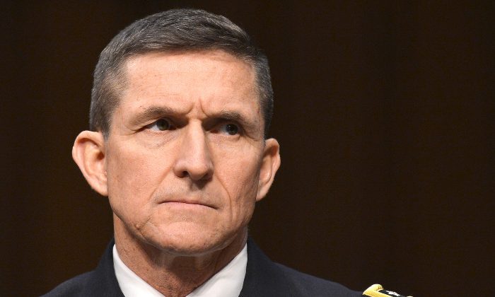 Then-Defense Intelligence Agency director Lt. Gen. Michael Flynn testifies before a committee hearing on “Current and Projected National Security Threats to the United States” at the Hart Senate Office Building in Washington on March 12, 2013. (JEWEL SAMAD/AFP/Getty Images)