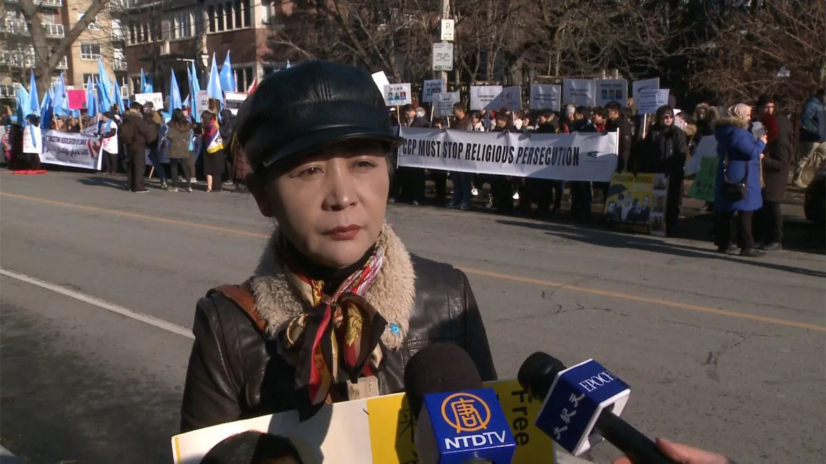 Sheng Xue of the Federation for a Democratic China speaks during a rally outside the Chinese consulate in Toronto on Jan. 4, 2019. Xue was part of the Canadian Coalition Against Communism that organized the rally, attended by around 100 people. (NTD Television)