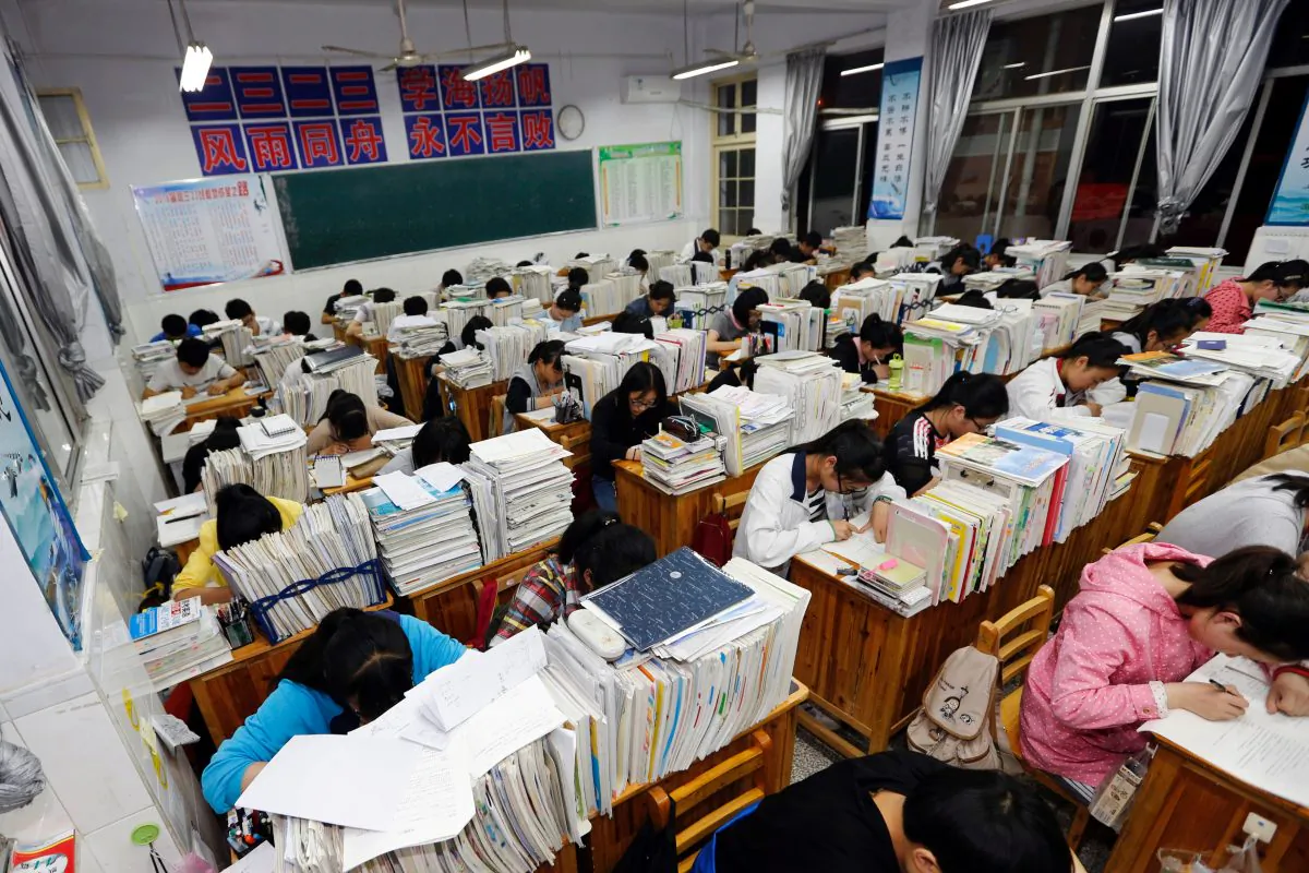 Senior high school students studying at night to prepare for the college entrance exams at a high school in Lianyungang, east China's Jiangsu province. (Getty Image)