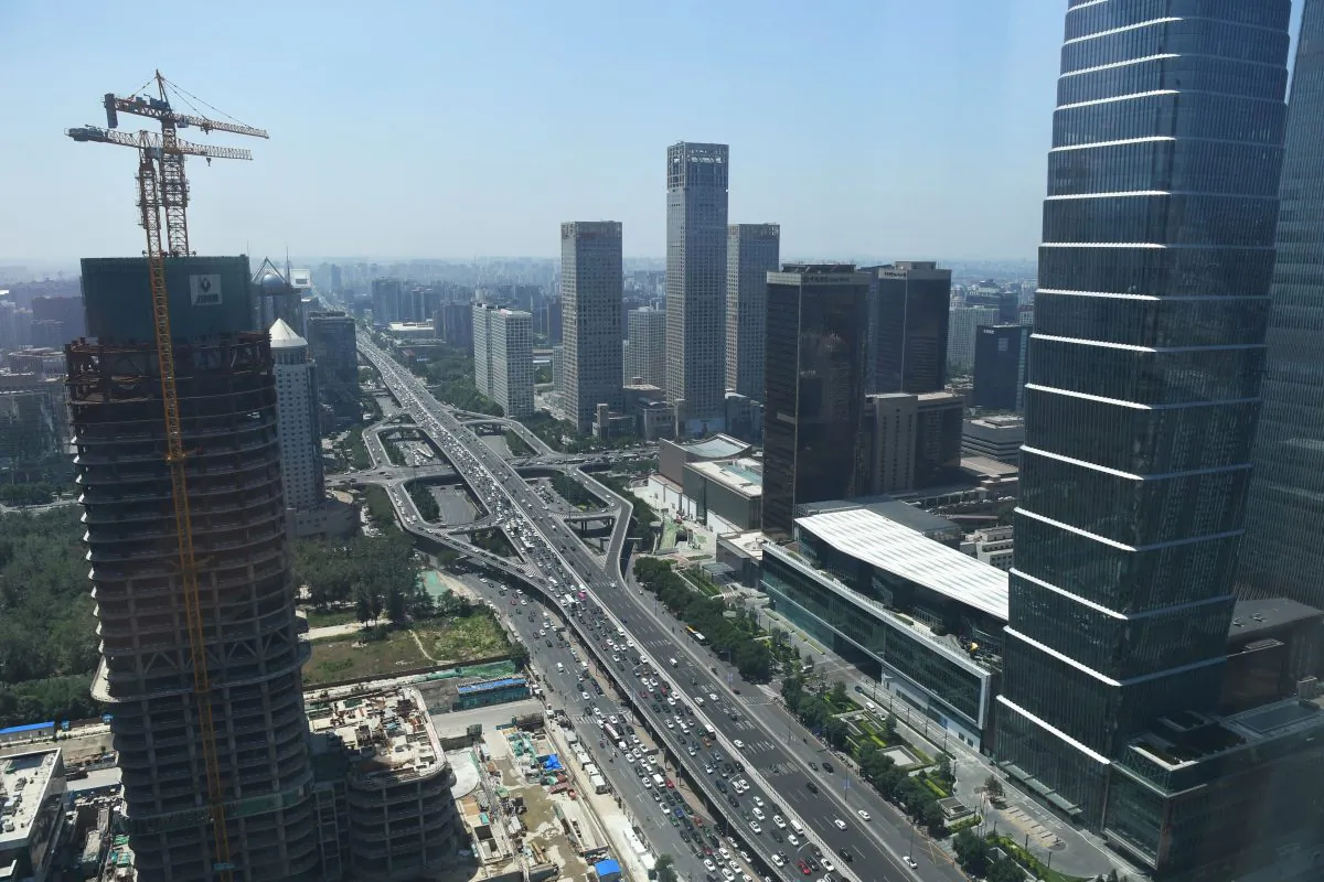 Buildings are seen under construction in the central business district of Beijing on June 14, 2018. (Greg Baker/AFP/Getty Images)