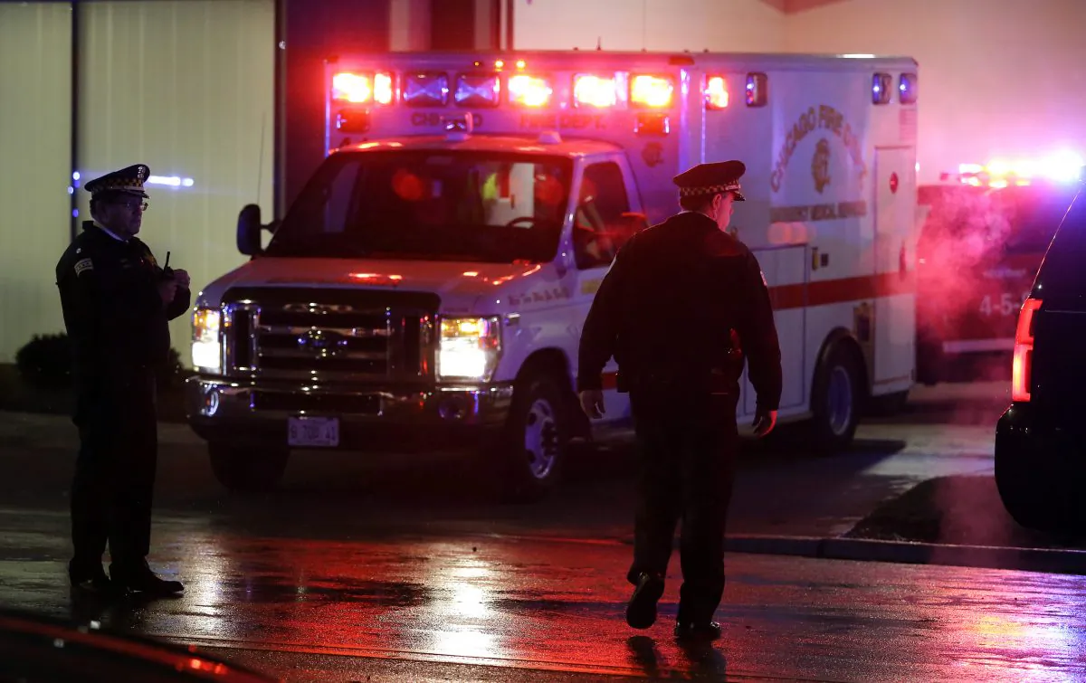 A stock photo shows an ambulance with lights flashing. (Joshua Lott/Getty Images)