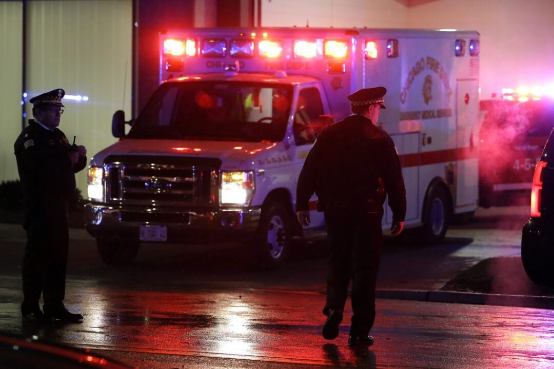 A stock photo shows an ambulance with lights flashing. (Joshua Lott/Getty Images)