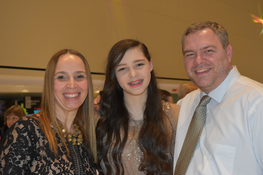 Suyney, Maeve, and James Benson attended Shen Yun Performing Arts at the Eisemann Center in Richardson, Texas, on Jan. 5, 2019. (Amy Hu/The Epoch Times)