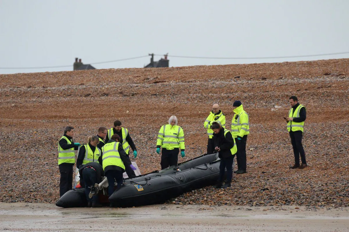 Britain's Border Force carry an intercepted migrant dinghy off the Kent coast, Britain Dec. 31, 2018 in this picture obtained from social media. (Twitter/Susan Pilcher via reuters)