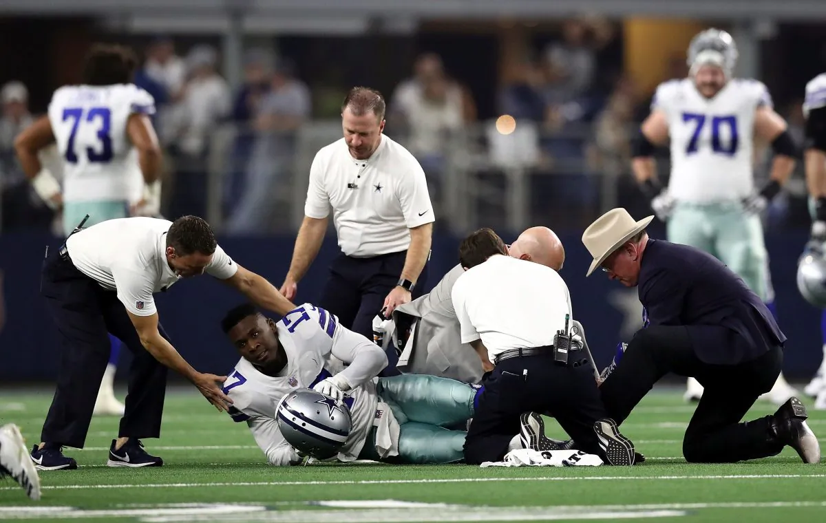 Allen Hurns #17 of the Dallas Cowboys is attended to after being injured in the first quarter during the Wild Card Round against the Seattle Seahawks at AT&T Stadium in Arlington, Texas, on Jan. 5, 2019. (Ronald Martinez/Getty Images)