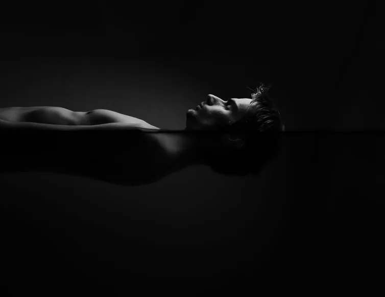 Being isolated in total darkness has many physical and psychological consequences, though can be therapeutic as well. (Vlue/Shutterstock)