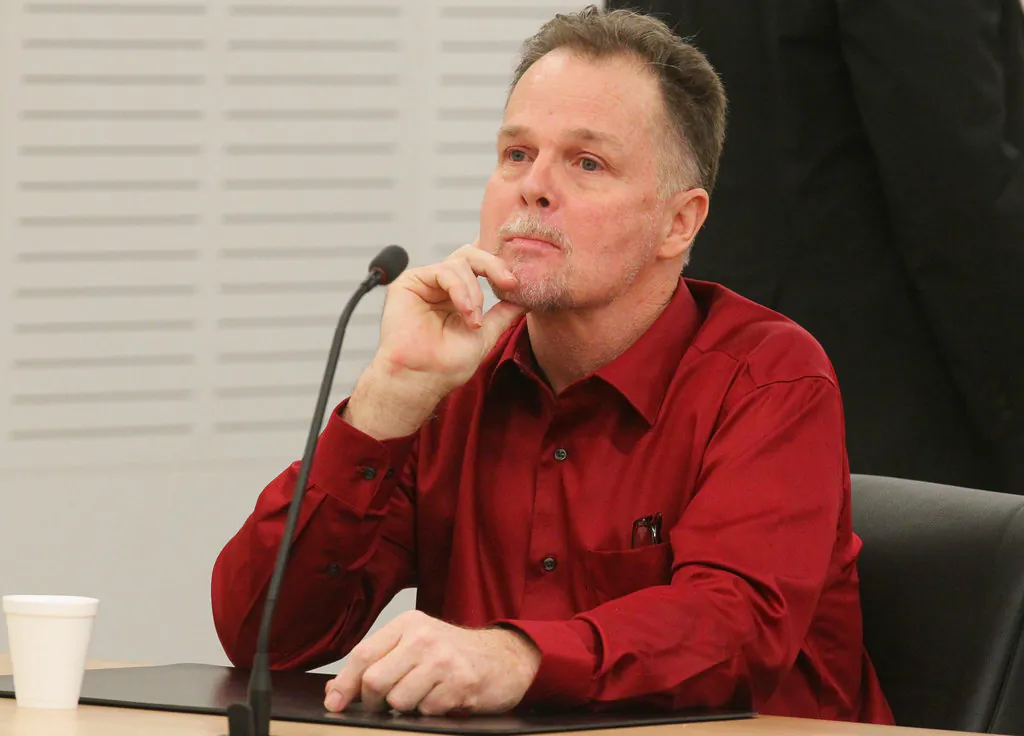 Charles "Chase" Merritt, who is charged in the deaths of a family of four whose bodies were found three years after their disappearance, waits for his preliminary hearing in San Bernardino, Calif. Opening statements are expected Monday, Jan. 7, 2018,  in the trial of Merritt for the murders of Joseph McStay, McStay’s wife Summer and their 3- and 4-year-old sons. The family disappeared from their San Diego County home in 2010. Three years later, their bodies were found in a remote desert location.  (John Gibbins/The San Diego Union-Tribune/AP)