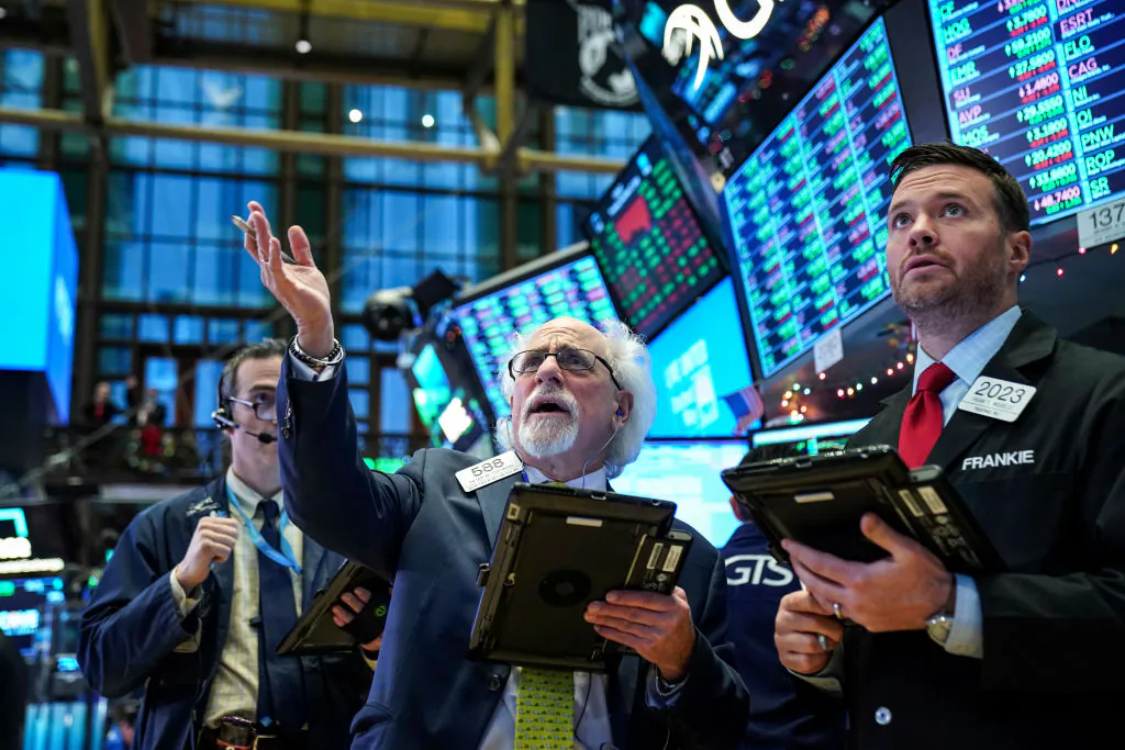 Traders and financial professionals work on the floor of the New York Stock Exchange in New York City on Dec. 27, 2018. (Drew Angerer/Getty Images)