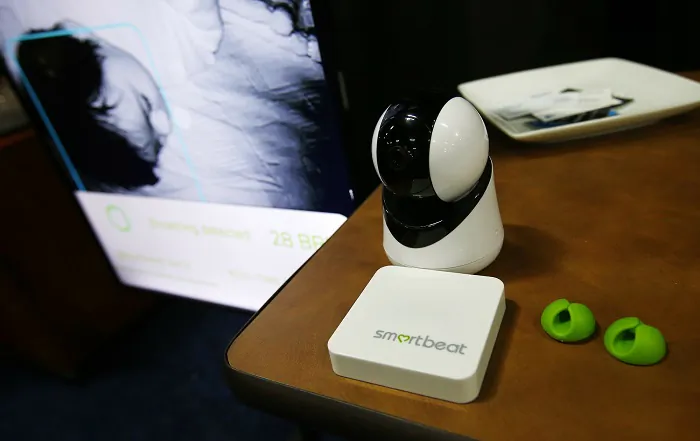 Smartbeat displays a internet connected camera that measures a baby's breathing rate and will send an alert to parents if any problems are detected, at CES Unveiled trade show in Las Vegas, Nev., on Jan. 6, 2019. (AP Photo/Ross D. Franklin)