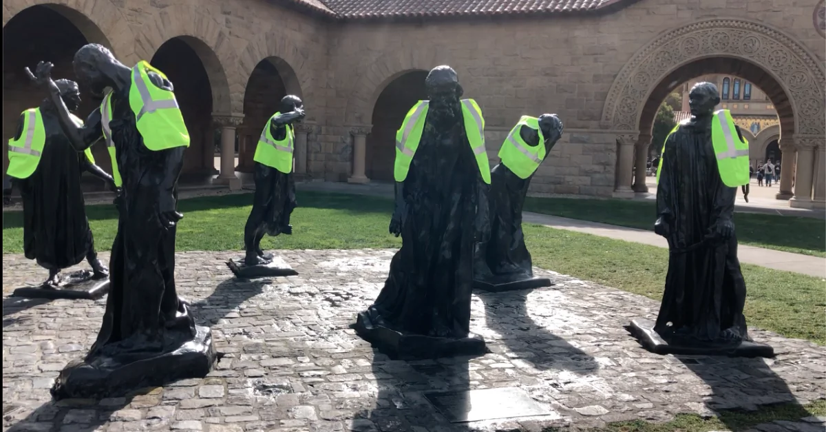 The group of statues called the Burghers of Calais, wearing yellow vests, on the campus of Stanford University in Palo Alto, Calif. on Jan. 7, 2018. (anonymous)