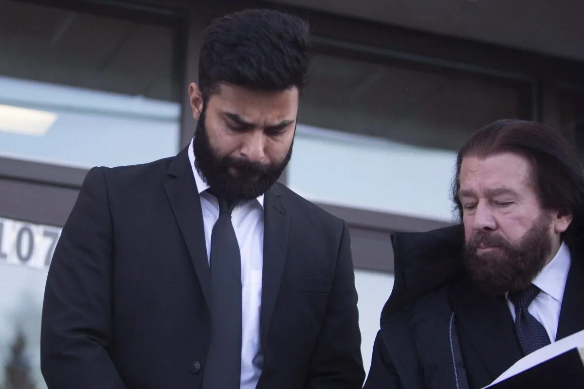 Jaskirat Singh Sidhu leaves provincial court in Melfort, Sask., on Jan. 8, 2019. (The Canadian Press/Kayle Neis)