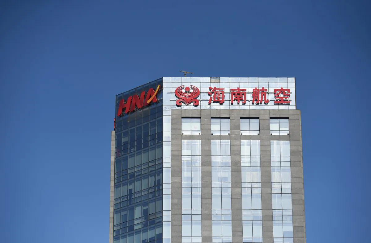 The HNA logo is seen on a building in Beijing on February 18, 2016. (Greg Baker/AFP/Getty Images)