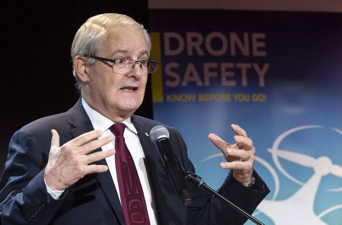 Federal Transport Minister Marc Garneau announces new rules to fly a drone in Canada during a news conference in Montreal on Jan. 9, 2019. (Paul Chiasson/The Canadian Press)