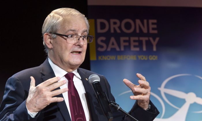 Federal Transport Minister Marc Garneau announces new rules to fly a drone in Canada during a news conference in Montreal on Jan. 9, 2019. (Paul Chiasson/The Canadian Press)