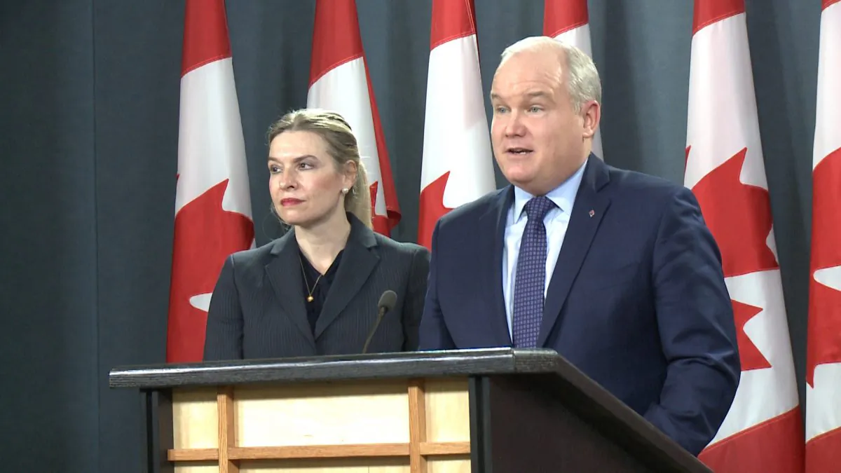Conservative MPs Stephanie Kusie (L) and Erin O’Toole speak at a press conference in Ottawa, Canada, on Jan. 8, 2018. (NTD Television)