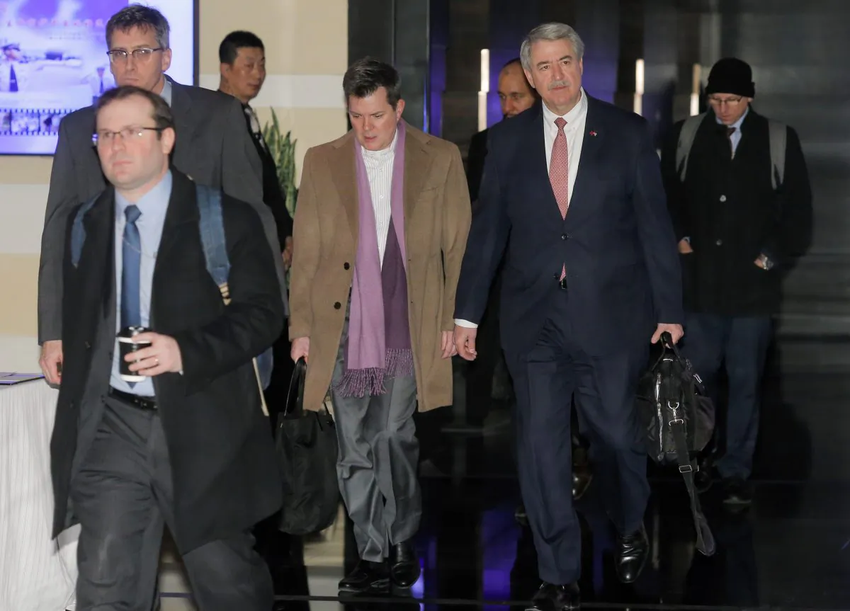 Ted McKinney (2nd R), the U.S. undersecretary for trade and foreign agricultural affairs and a member of the U.S. trade delegation to China, leaves a hotel with other officials in Beijing, on Jan. 7, 2019. (Thomas Peter/Reuters)