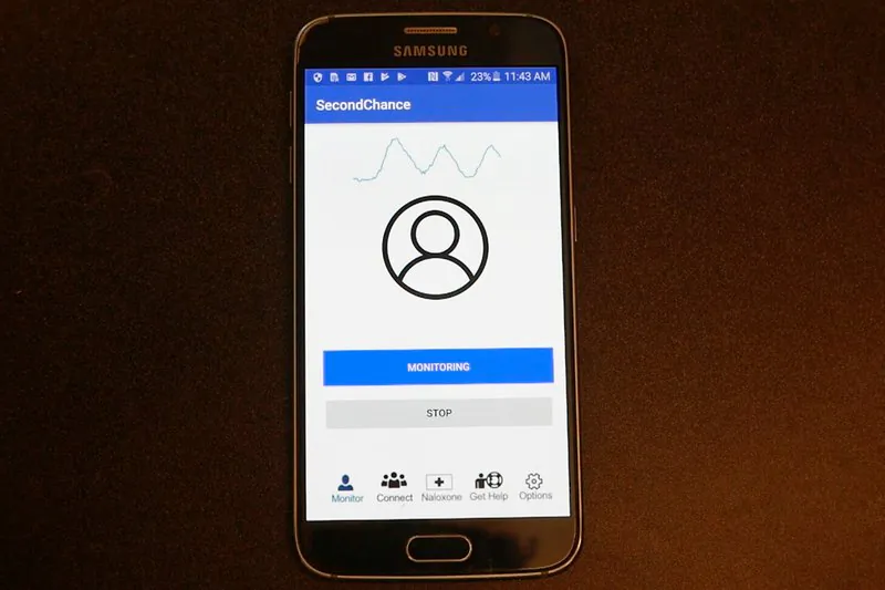 This image from video provided by the University of Washington in January 2019 shows a demonstration of the smartphone app developed by Rajalakshmi Nandakumar, Shyamnath Gollakota and Jacob E. Sunshine that uses sound waves to measure breathing. (Mark Stone/University of Washington via AP)