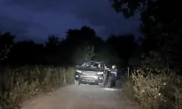 Officer Grapples With Fugitive for Control of Gun Before Colleague Arrives, in Dramatic Video