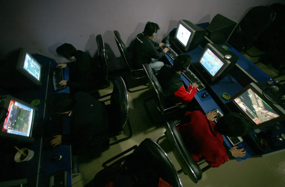 People surf the internet at a cyber cafe in Chongqing Municipality, China on Jan. 24, 2007. (China Photos/Getty Images)