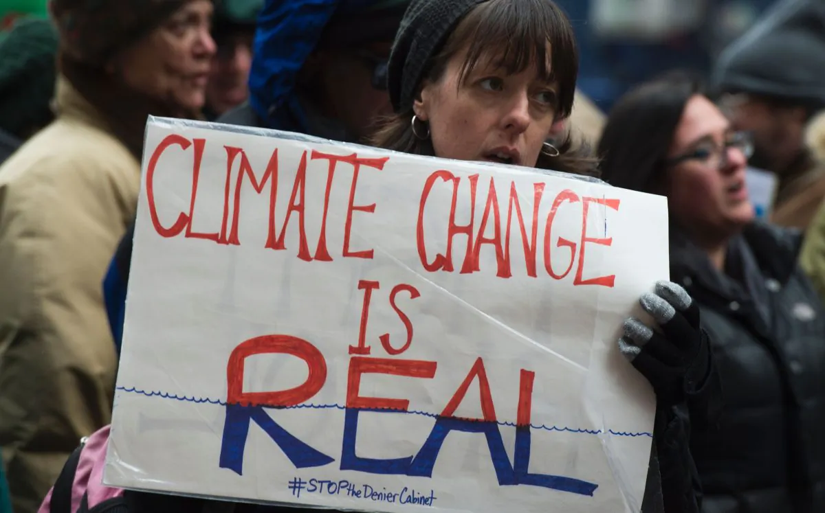 Climate activists rally to urge politicians to stand against climate denial in New York on Jan. 9, 2017. 
(Don Emmert/AFP/Getty Images)