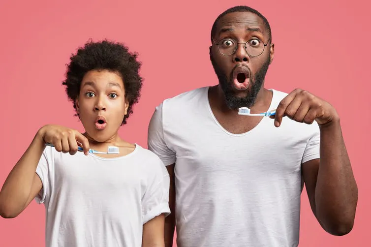 Don't be surprised by cavities at your next dentist appointment. Brush well, use fluoride toothpaste, and get some disclosing tablets to see what you are missing. (WAYHOME Studio/Shutterstock)