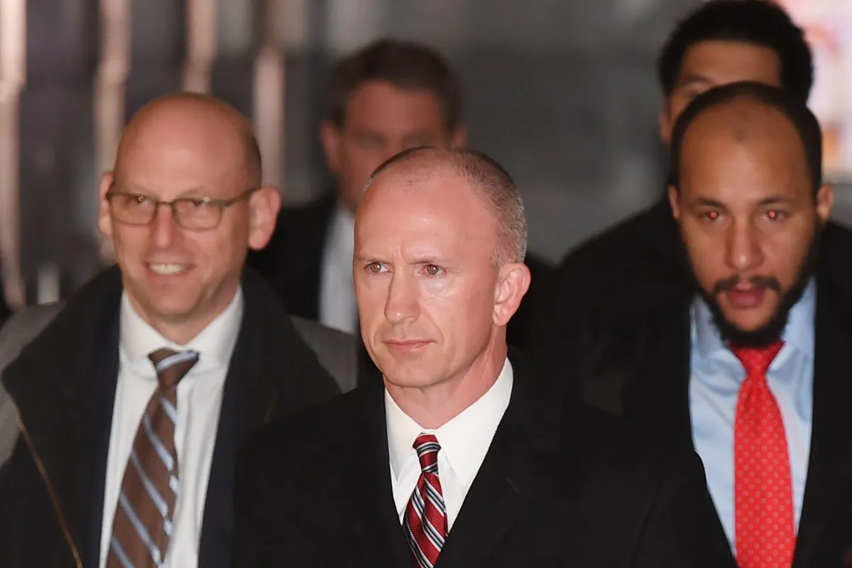 Deputy US Trade Representative Jeffrey Gerrish (C) leaves a hotel with his negotiation team for the second day of talks in Beijing on Jan. 8, 2019. (GREG BAKER/AFP/Getty Images)