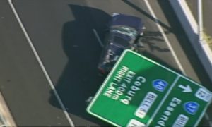 Overhead Road Sign Falls and Crushes Car in Freak Accident, Woman Injured