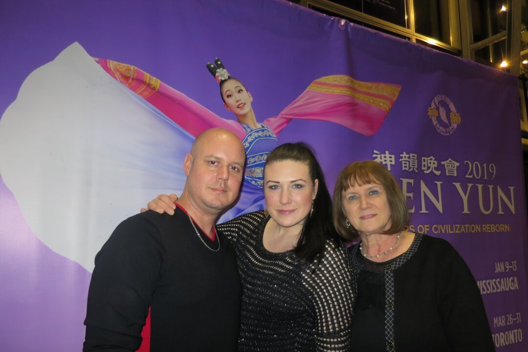 (L-R) Andrew Crawford, Natalie Lewandowski, and Mira Lewandowski were deeply touched by Shen Yun Performing Arts at the Living Arts Centre in Mississauga, Canada on Jan. 10, 2019. (Weiya Wang/The Epoch Times)