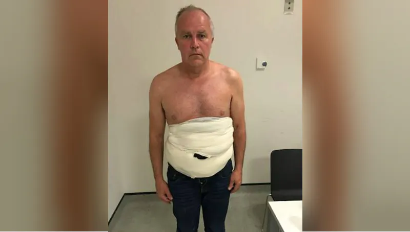 Jeffrey Lendrum, pictured at Heathrow Airport carrying 19 eggs round his waist on June 26, 2018.
(Home Office)
