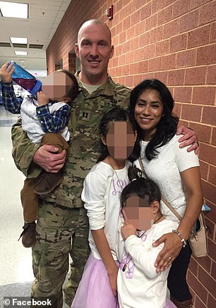 Gooch with wife and three kids