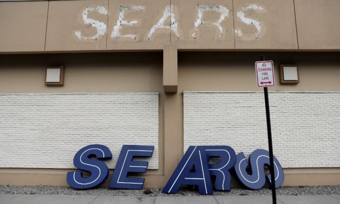 A dismantled sign sits leaning outside a Sears department store one day after it closed as part of multiple store closures by Sears Holdings Corp in the United States in Nanuet, New York, U.S., January 7, 2019. (Mike Segar/Reuters)