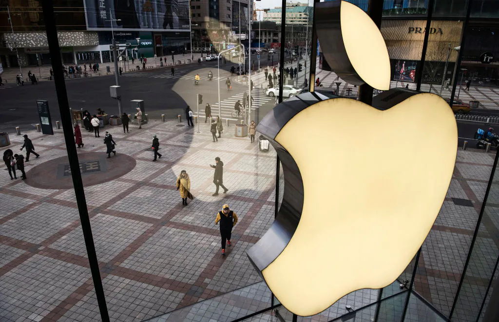 The Apple logo is seen on the window at an Apple Store on Jan. 7, 2019 in Beijing, China. (Kevin Frayer/Getty Images)