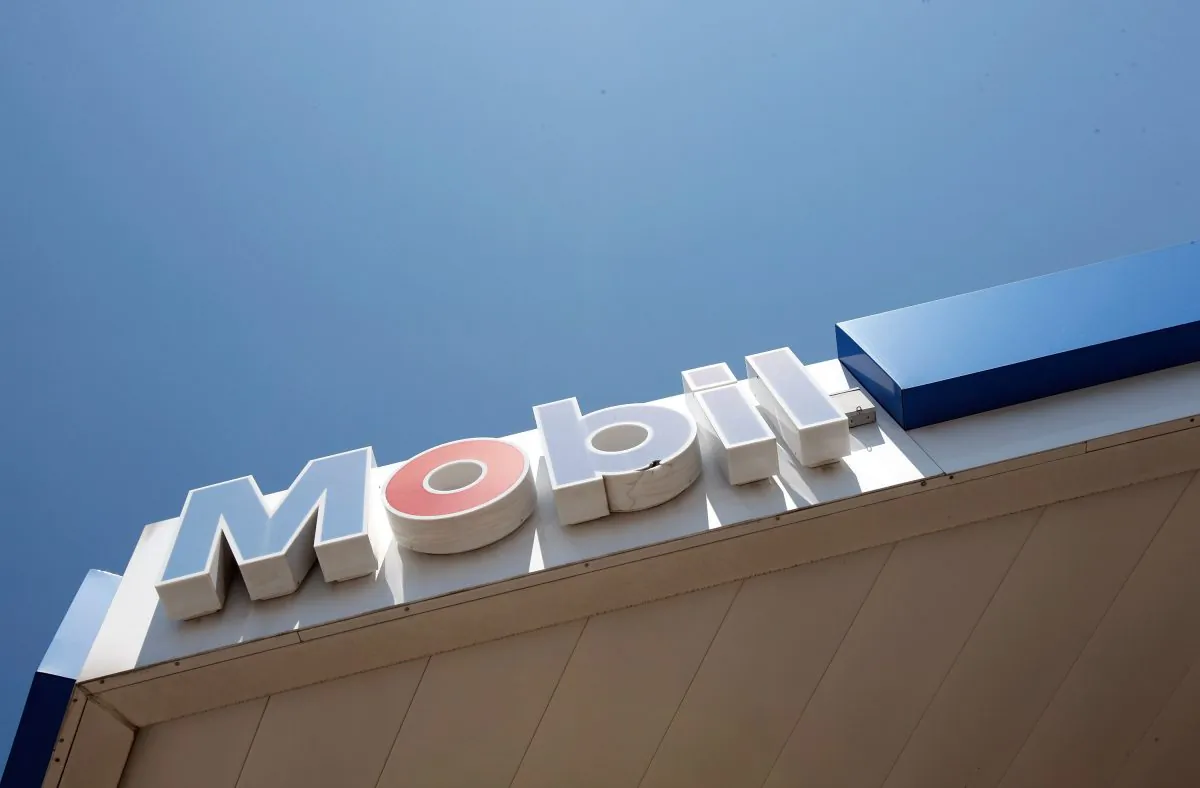 A sign at an Mobile station Jul. 29, 2010 in Chicago, Illinois. Exxon Mobile's quarterly profits were released July 27 showing a second-quarter earnings increase of 91 percent beating analyst's profit expectations.  (John Gress/Getty Images)