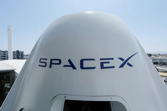 The top of a replica Crew Dragon spacecraft is show at SpaceX headquarters in Hawthorne, Calif., on Aug. 13, 2018. (Mike Blake/Reuters)