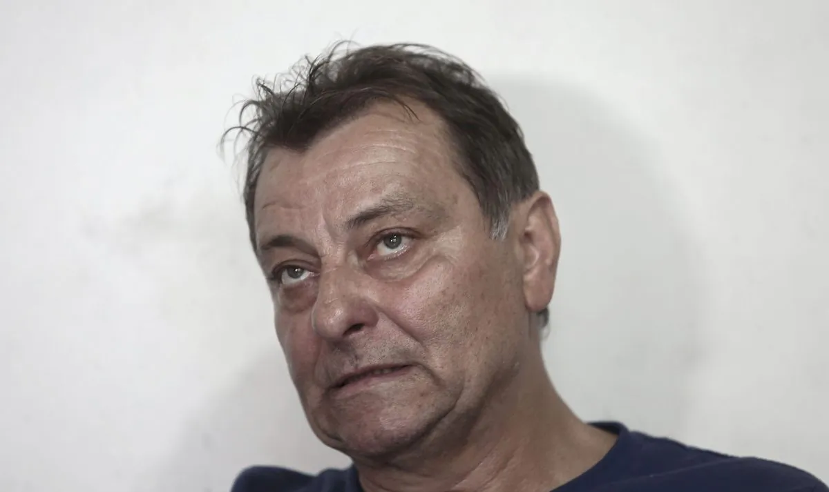 Italian leftist militant Cesare Battisti gestures during an interview with AFP in Cananeia, Sao Paulo state, Brazil, on Oct. 20, 2017.  (Miguel Schincariol/AFP/Getty Images)