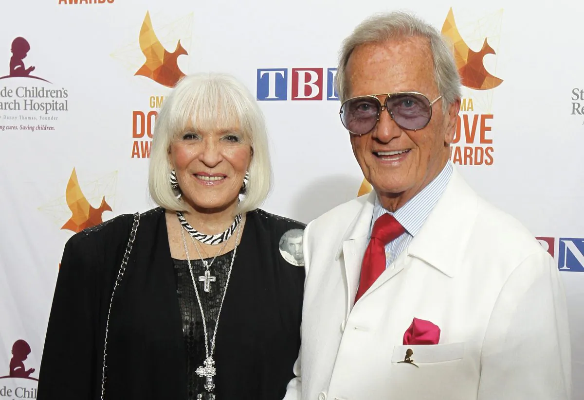 Pat Boone, right, and wife Shirley Boone arrive at Lipscomb University for the Dove Award, in Nashville, Tenn., on Oct. 7, 2014. (Wade Payne/Invision/AP)