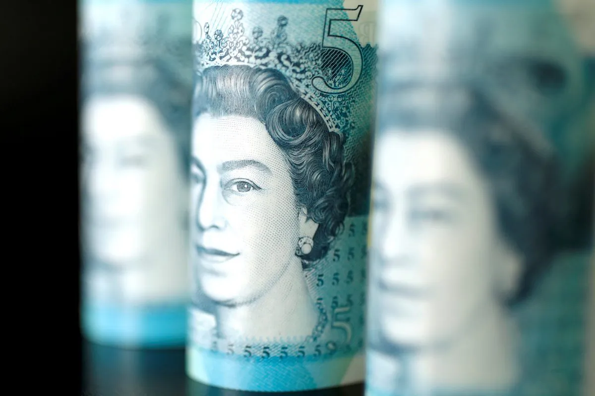 British five pound banknotes are seen in this picture illustration taken Nov. 14, 2017. (Benoit Tessier/Illustration/Reuters)