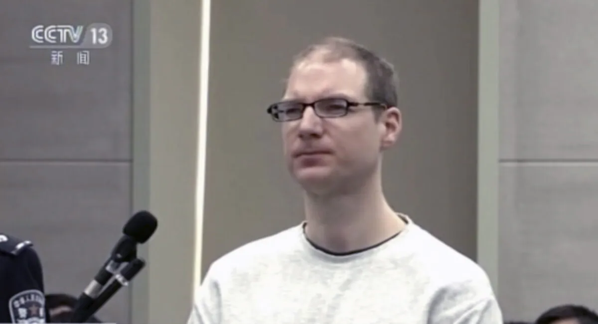 Canadian Robert Lloyd Schellenberg attends his retrial at the Dalian Intermediate People's Court in Dalian, northeastern China's Liaoning Province, on Jan. 14, 2019. (CCTV via AP)