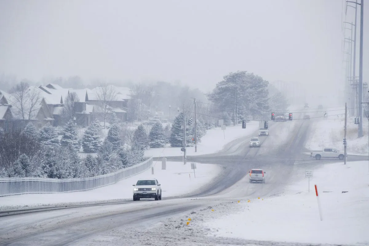 Cars during a snow storm in a file photo. (Ryan Soderlin/Omaha World-Herald via AP)