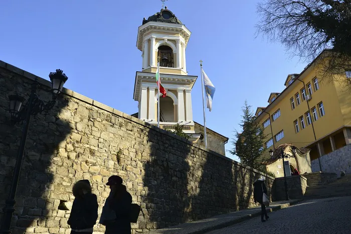 People are silhouetted as they walk in the old town of Plovdiv, ahead of the opening ceremony of Plovdiv as the European Capital of Culture, in Bulgaria, on Jan. 12, 2019. Plovdiv is the first Bulgarian town named to celebrate the most prestigious cultural initiative of the European Union, along with the Italian city of Matera as the twin European Capital of Culture for 2019. (AP Photo)