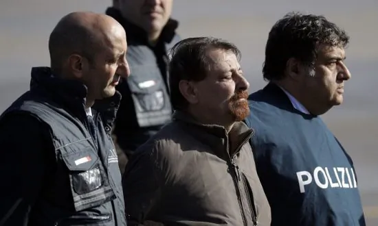 Italian Fugitive Brought Home To Serve Life Term For Murder