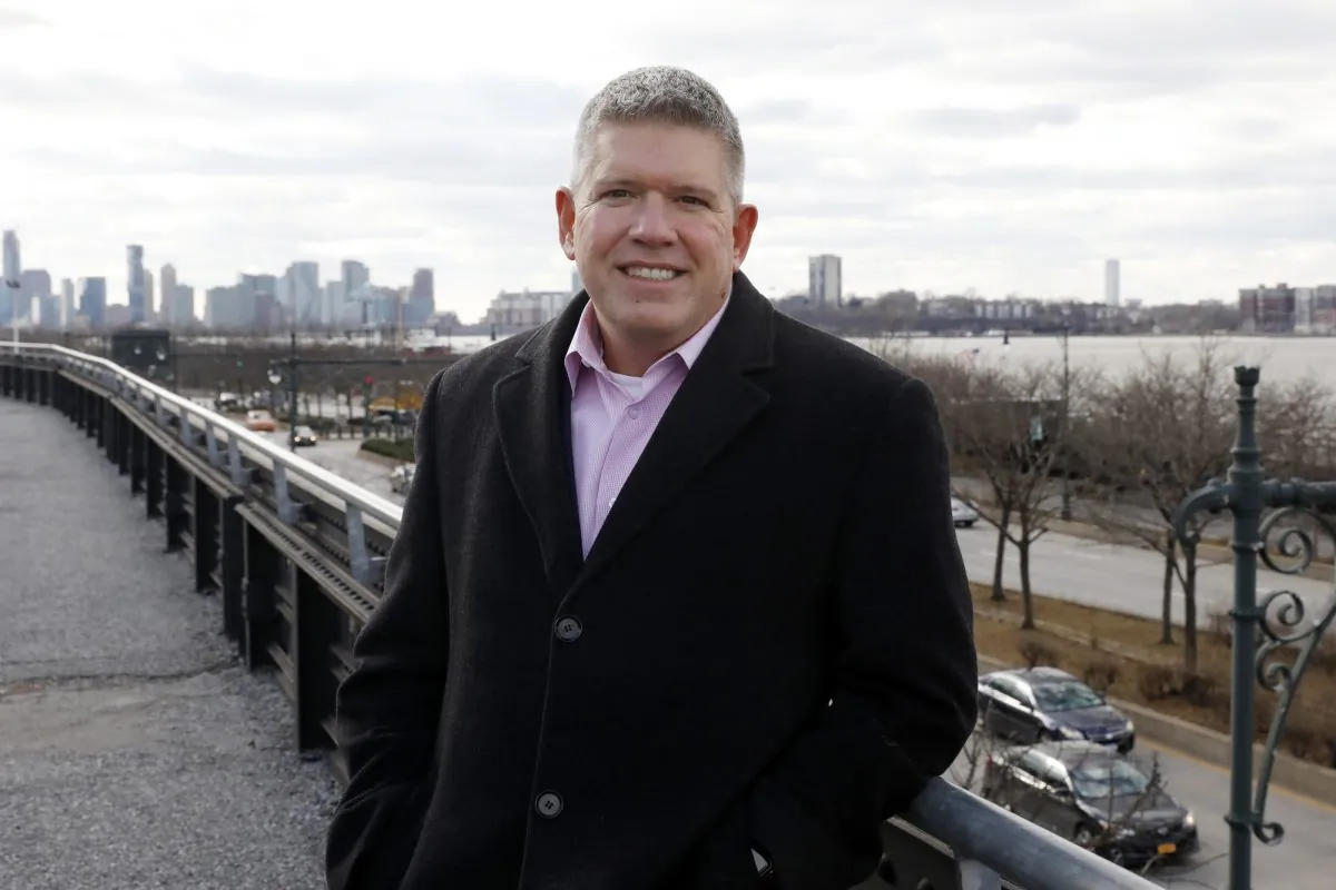 Tripp Harris, who was a passenger on US Airways Flight 1549, the "Miracle on the Hudson" airliner in 2009, poses for a photo on the High Line along the Hudson River in New York. (Richard Drew/AP Photo)
